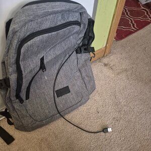 Black medium-sized Denim-like Backpack.